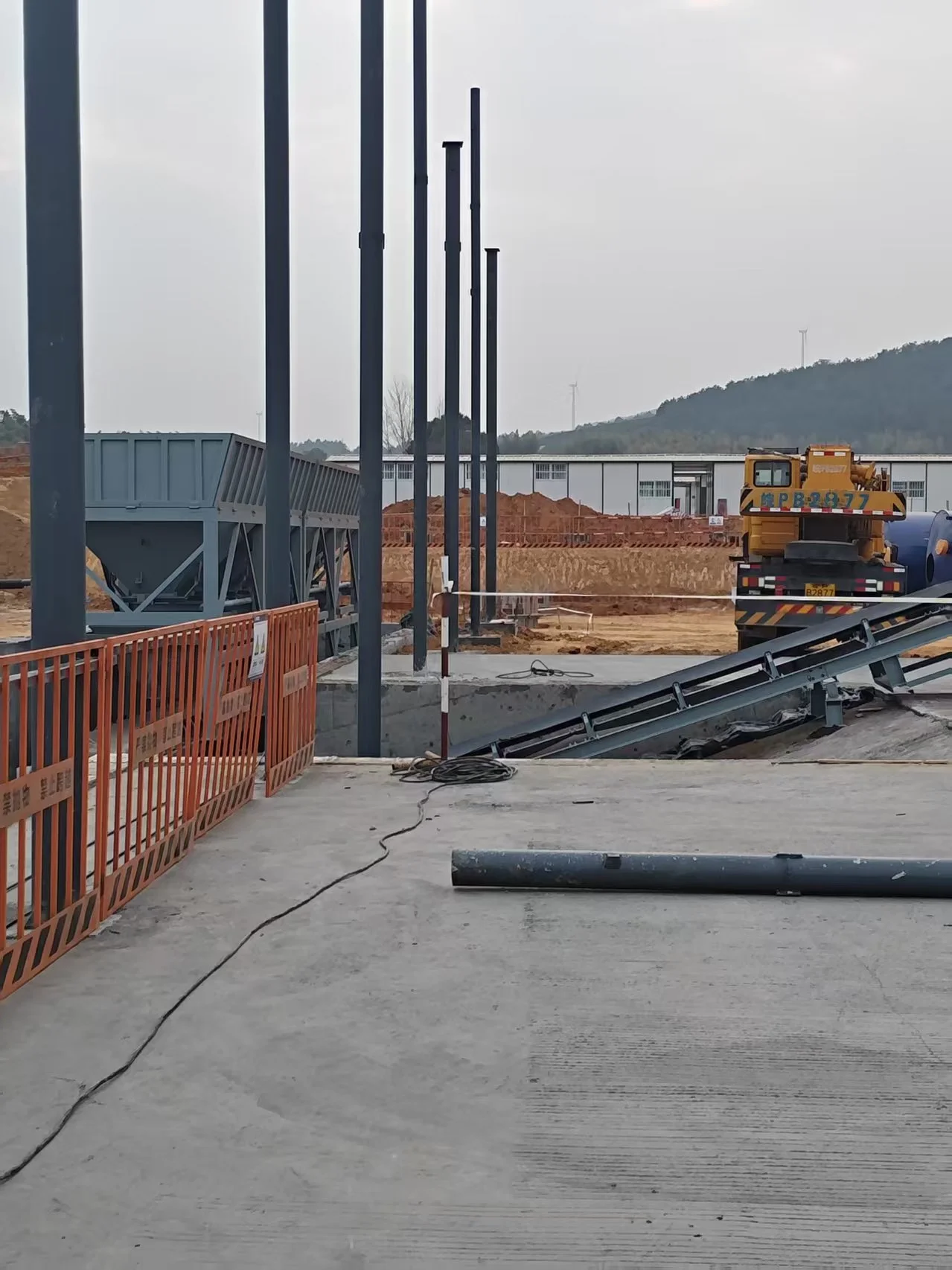 Installation de centrale à béton jumelée au Ghana